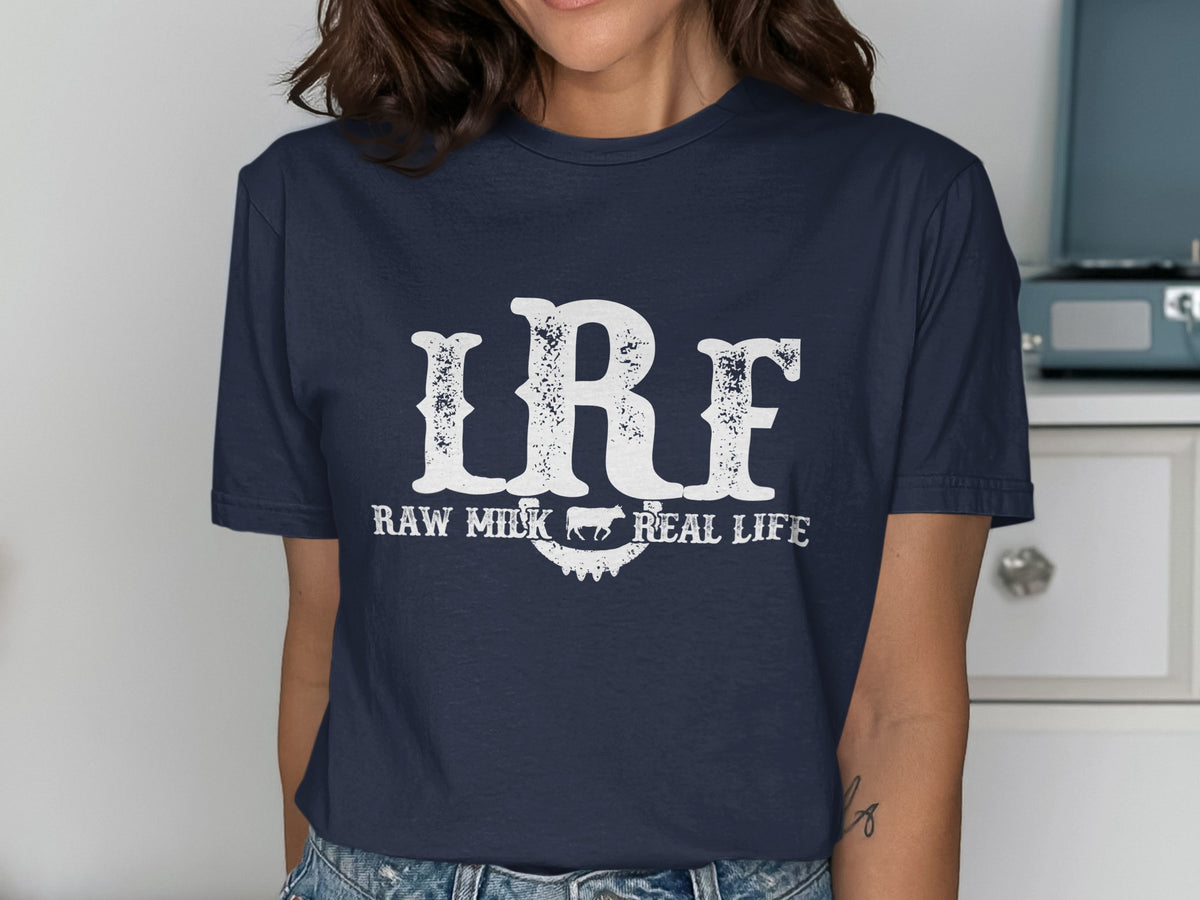 Dark blue t-shirt with distressed white text "IRF RAW MILK REAL LIFE".