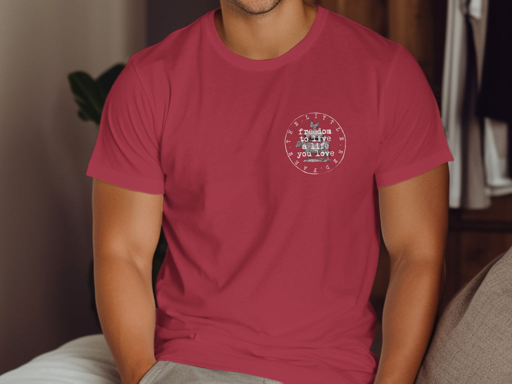 Red t-shirt with circular graphic featuring cow, chickens, and text: freedom to live a life you love.