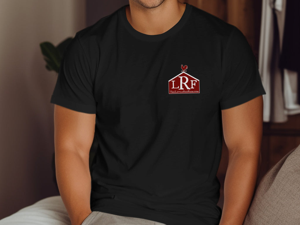 Black t-shirt with a red barn logo, rooster, and TheLittleRedFarm.com.