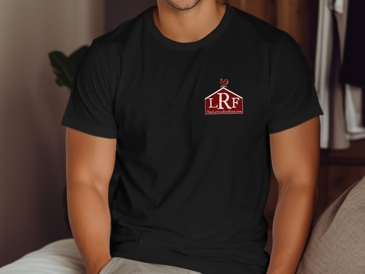 Black t-shirt with a red barn logo, rooster, and TheLittleRedFarm.com.