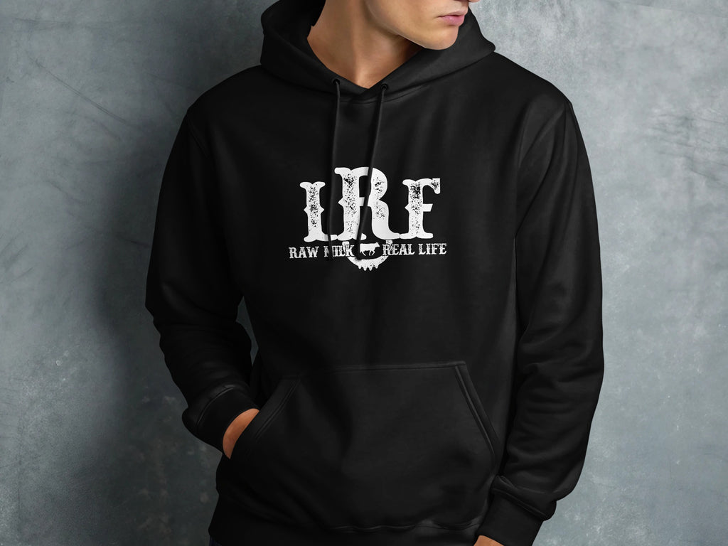 A person wearing a black hooded sweatshirt with a distressed white RRF logo and text.