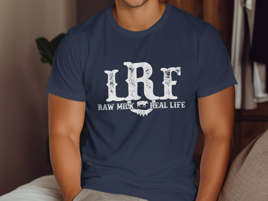 Navy t-shirt with white text "LRF" and "RAW MILK REAL LIFE" with a cow graphic.