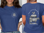 Blue t-shirt with "The Little Red Farm" and animal illustration on back.