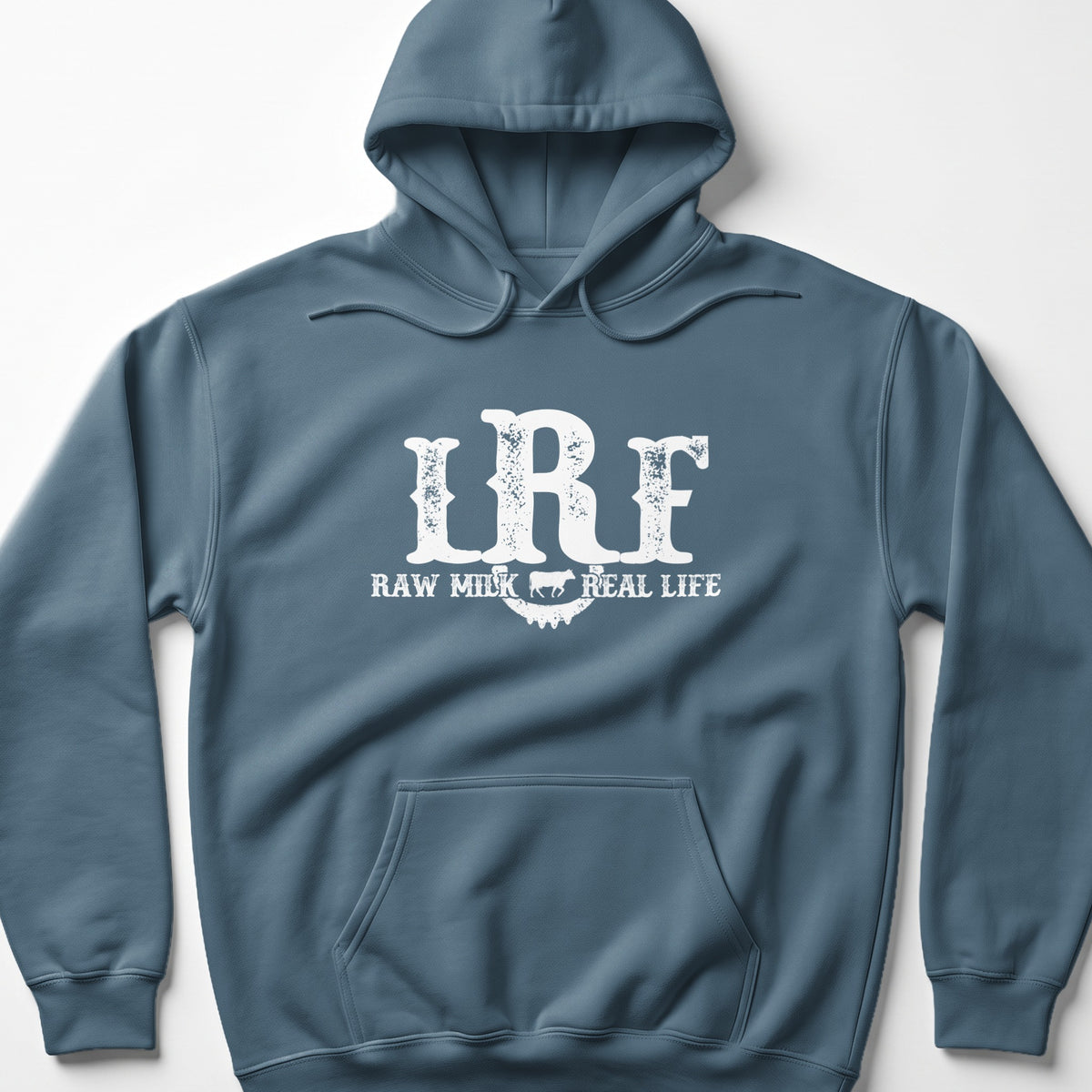 Blue hoodie with white "IRF RAW MILK REAL LIFE" text and cow graphic.