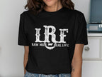 Black t-shirt with white text "IRF" and "RAW MILK REAL LIFE" and cow graphic.